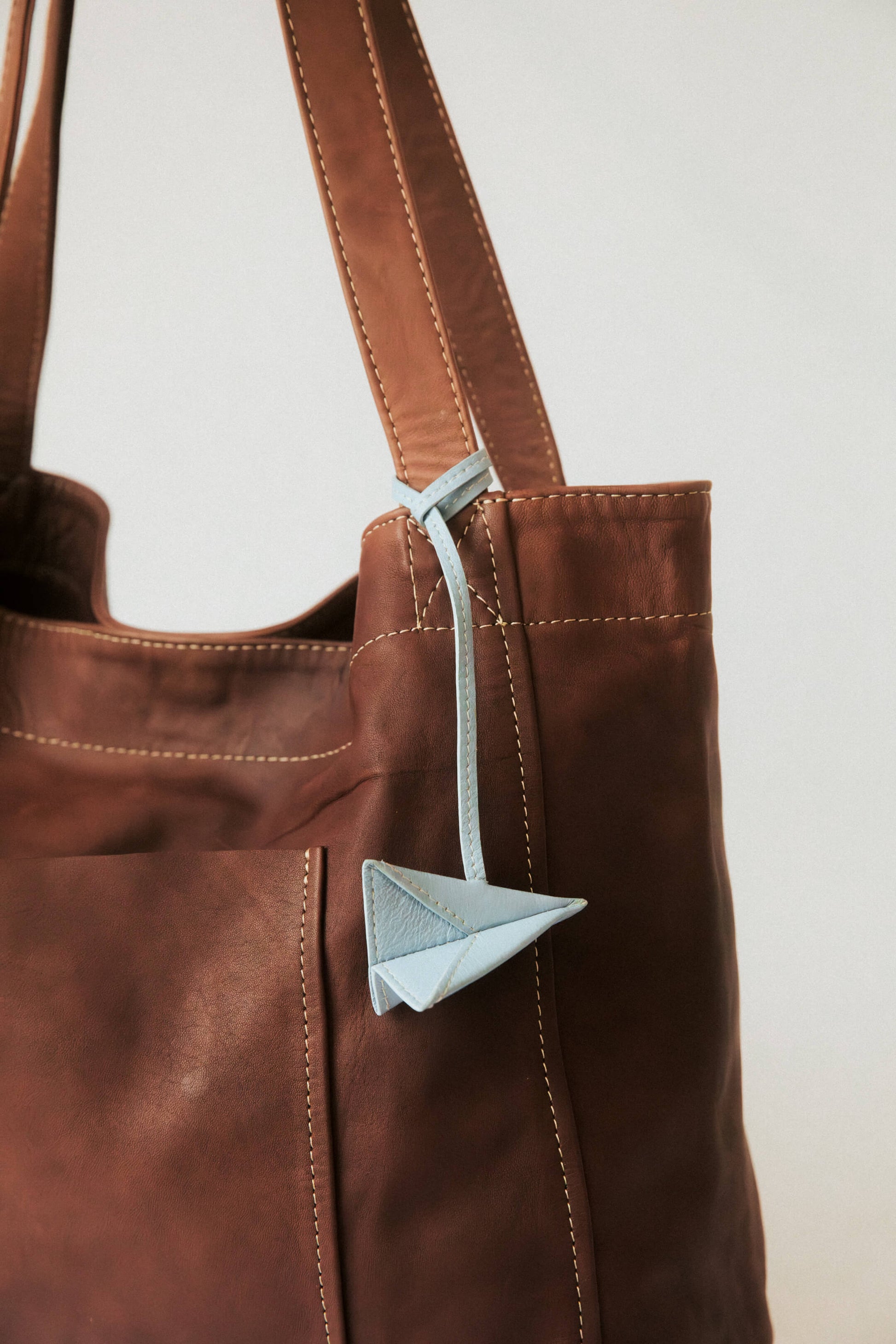 Paper Airplane Bag Charm Blue Jeans