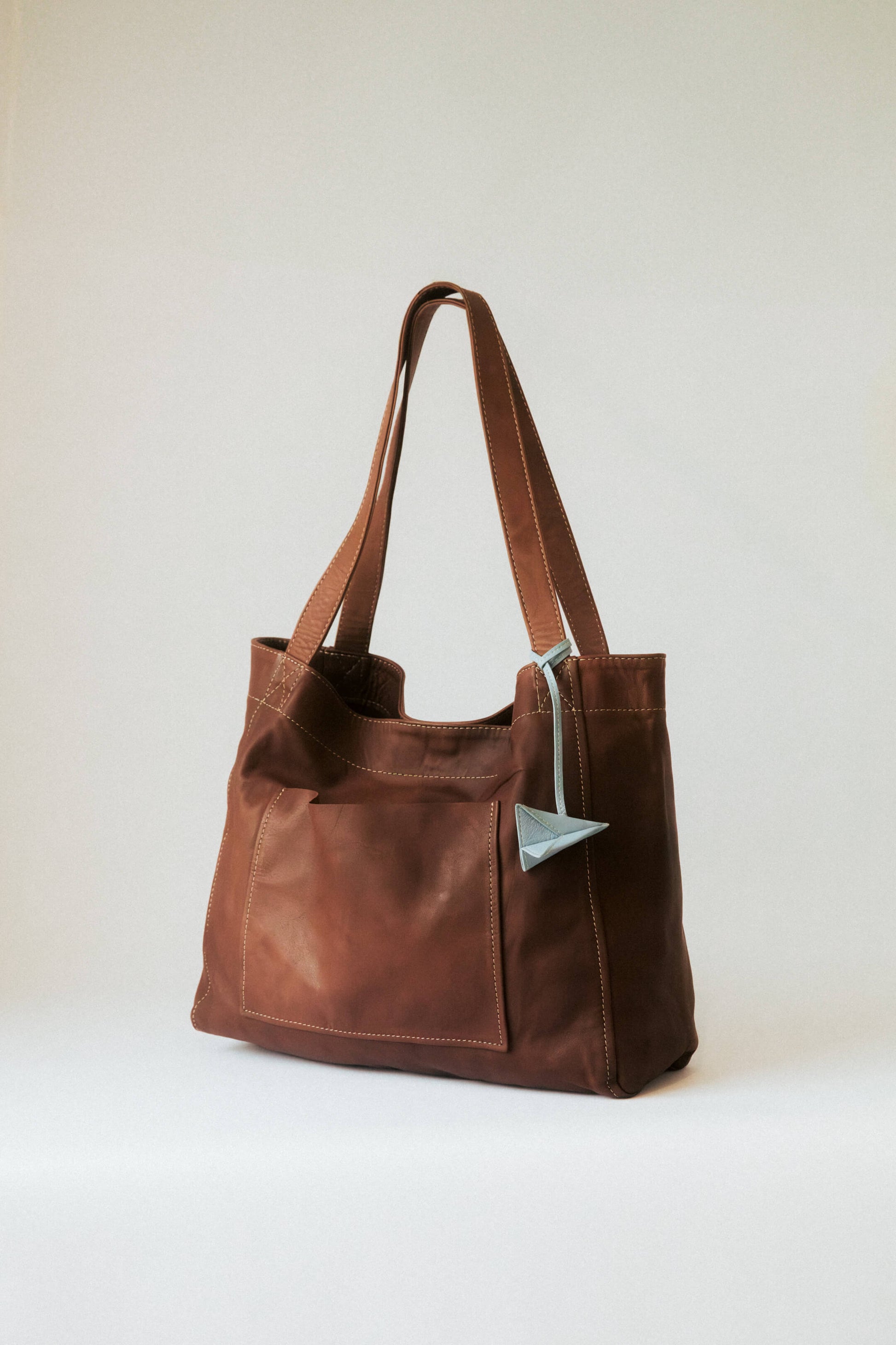 Paper Airplane Bag Charm Blue Jeans